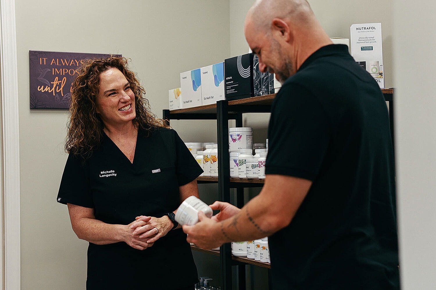 Consultation in wellness store with products displayed.