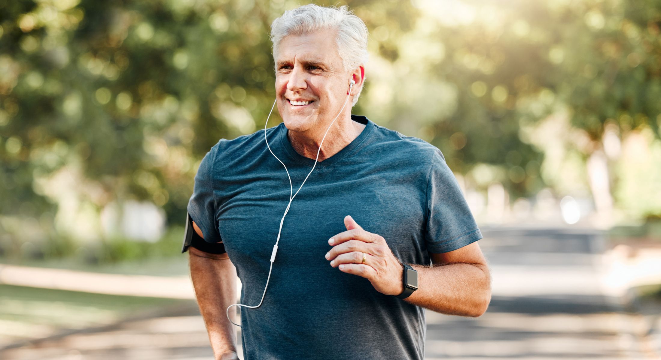 Group workout session with dumbbells in gym.